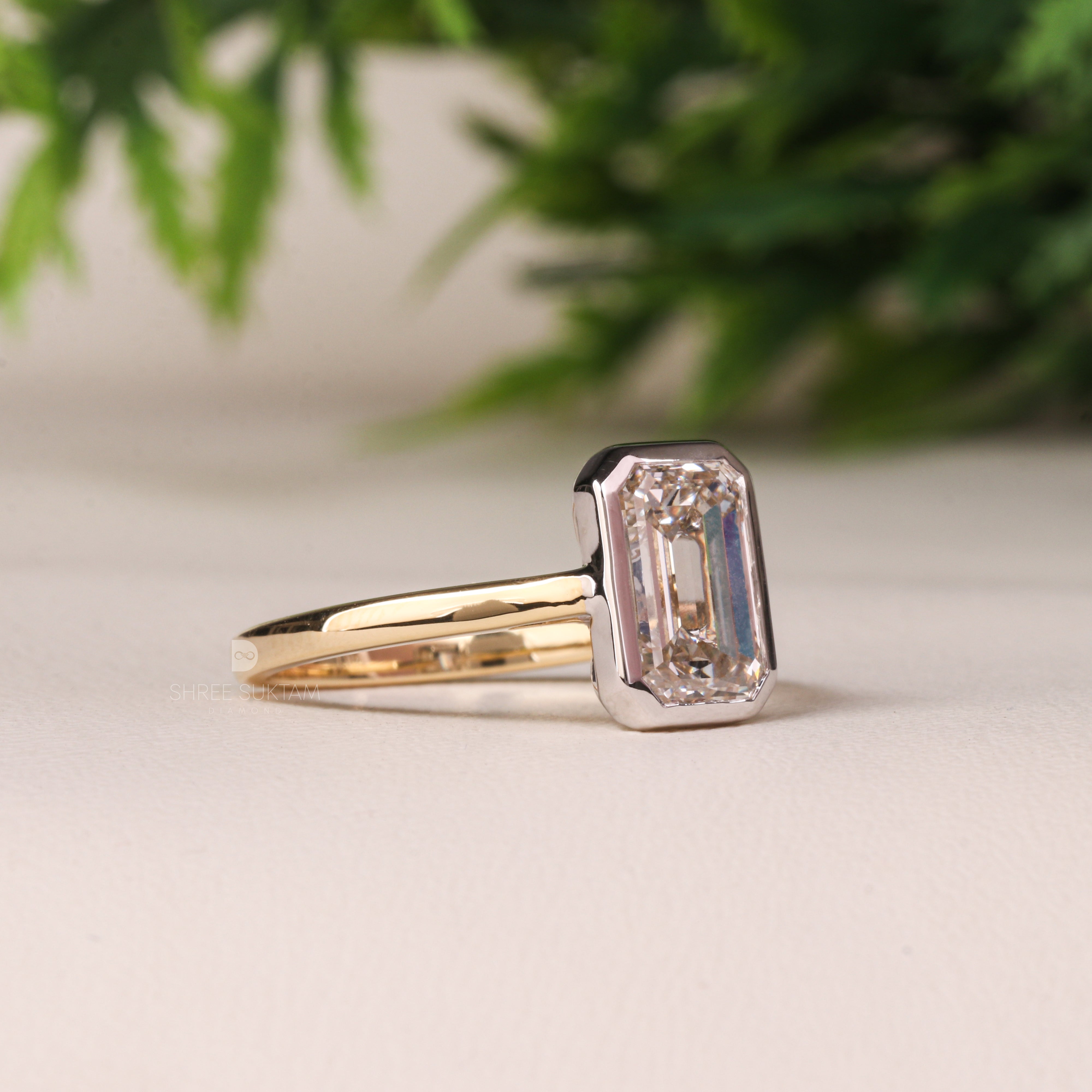 emerald cut diamond ring, bezel set engagement ring, yellow gold diamond ring, minimalist diamond ring, solitaire engagement ring, emerald cut solitaire ring, modern bridal jewelry, classic gold ring, dainty diamond ring, handmade engagement ring, fine gold jewelry, custom diamond ring, timeless engagement ring, wedding ring for women, luxury diamond ring, ethical gold ring, emerald ring for proposal, gift for her Western Ring 