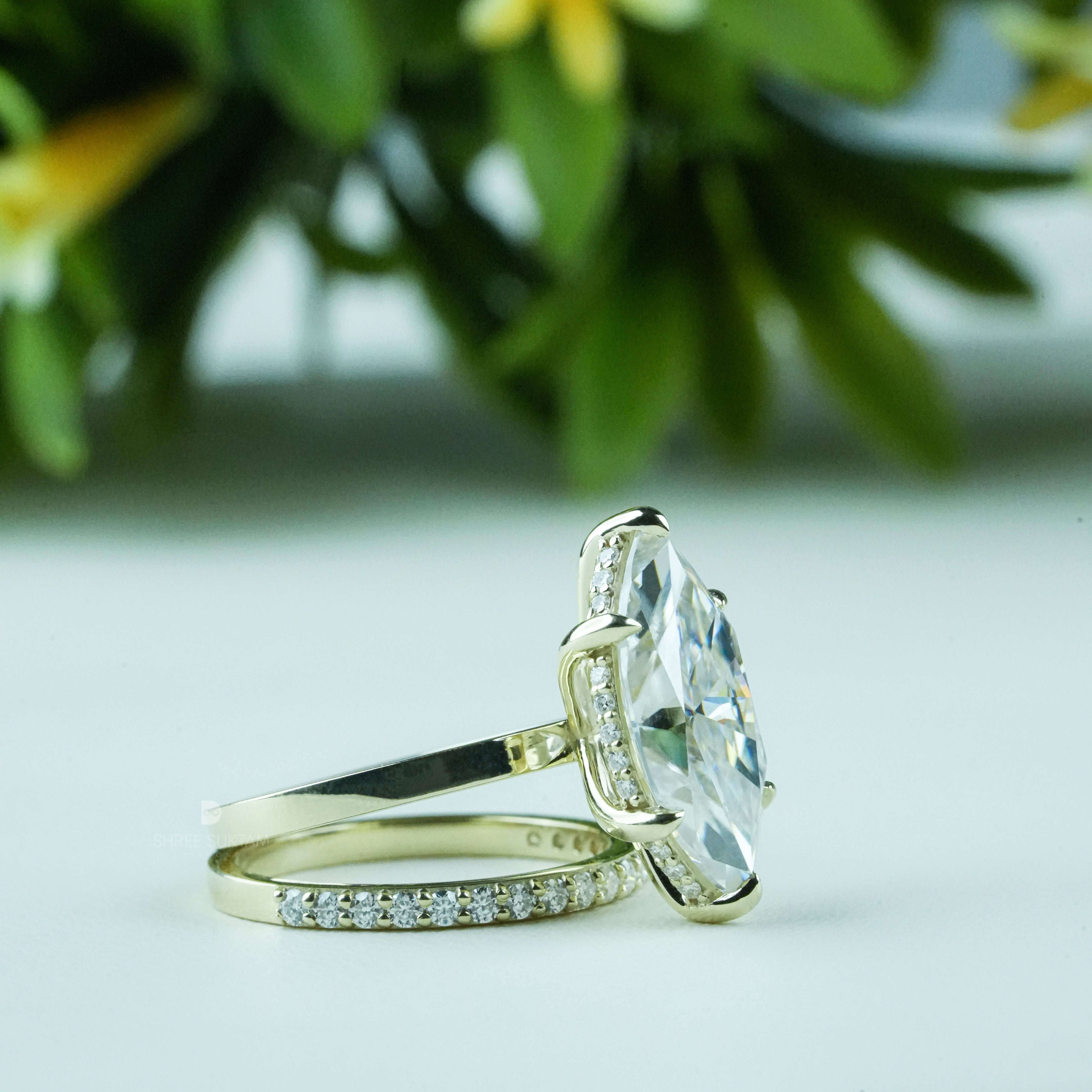 marquise cut diamond ring, gold engagement ring, bridal ring set, diamond wedding band, solitaire diamond ring, marquise engagement ring, anniversary gift for her, gold bridal jewelry, unique engagement ring, dainty eternity band, gold diamond ring, timeless wedding set, marquise solitaire ring, luxury bridal jewelry, handmade gold ring, wedding jewelry set, classic marquise ring, elegant proposal ring, gold stacking ring, fine jewelry gift for women