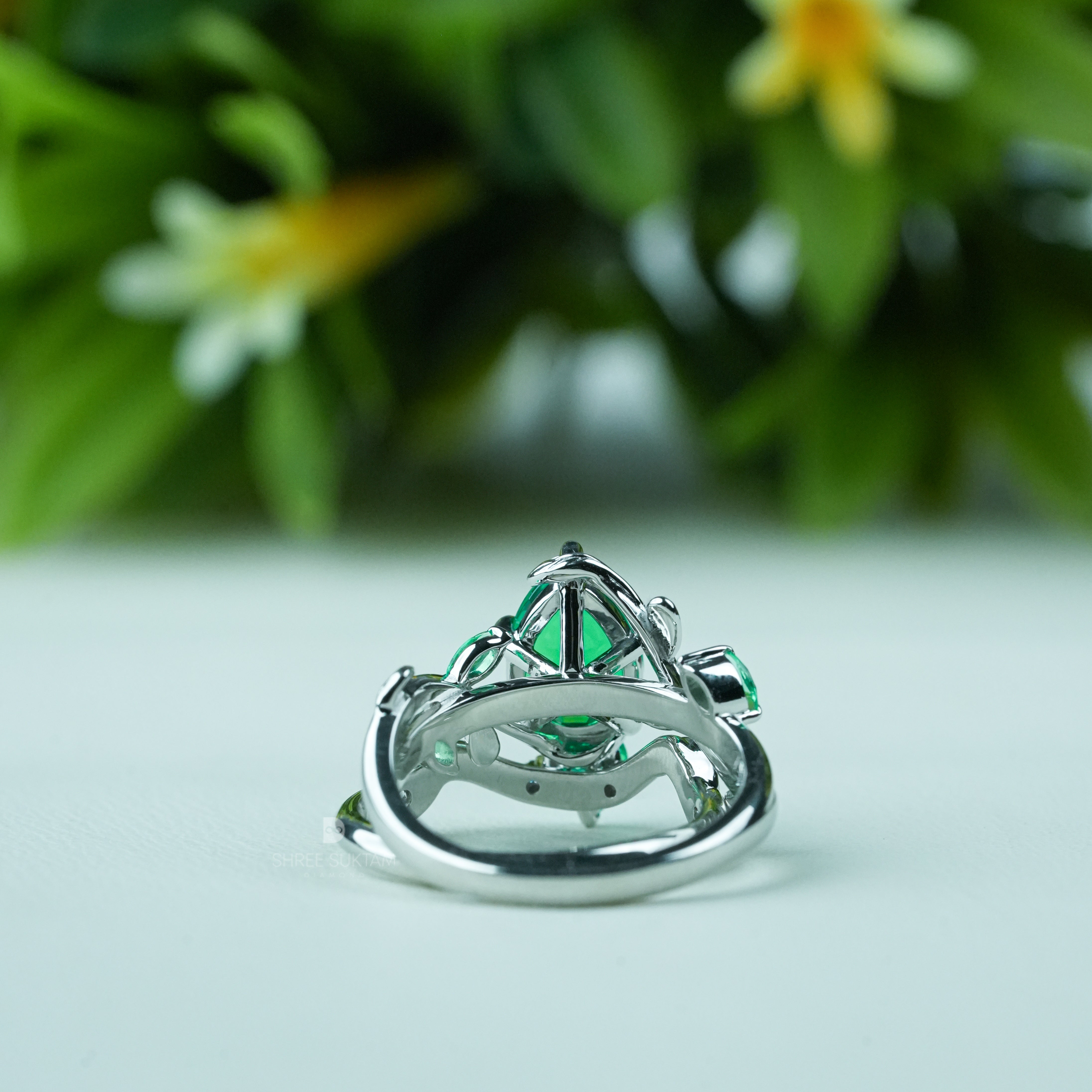 Emerald engagement ring, nature inspired ring, vine leaf ring, silver emerald jewelry, green gemstone ring, pear cut emerald ring, statement emerald ring, vintage style emerald ring, botanical jewelry, leaf design ring, gemstone promise ring, emerald wedding ring, nature lover jewelry, unique emerald ring, silver gemstone ring, anniversary gift ring, handmade emerald jewelry, bridal emerald ring, boho emerald ring, luxury gemstone jewelry.