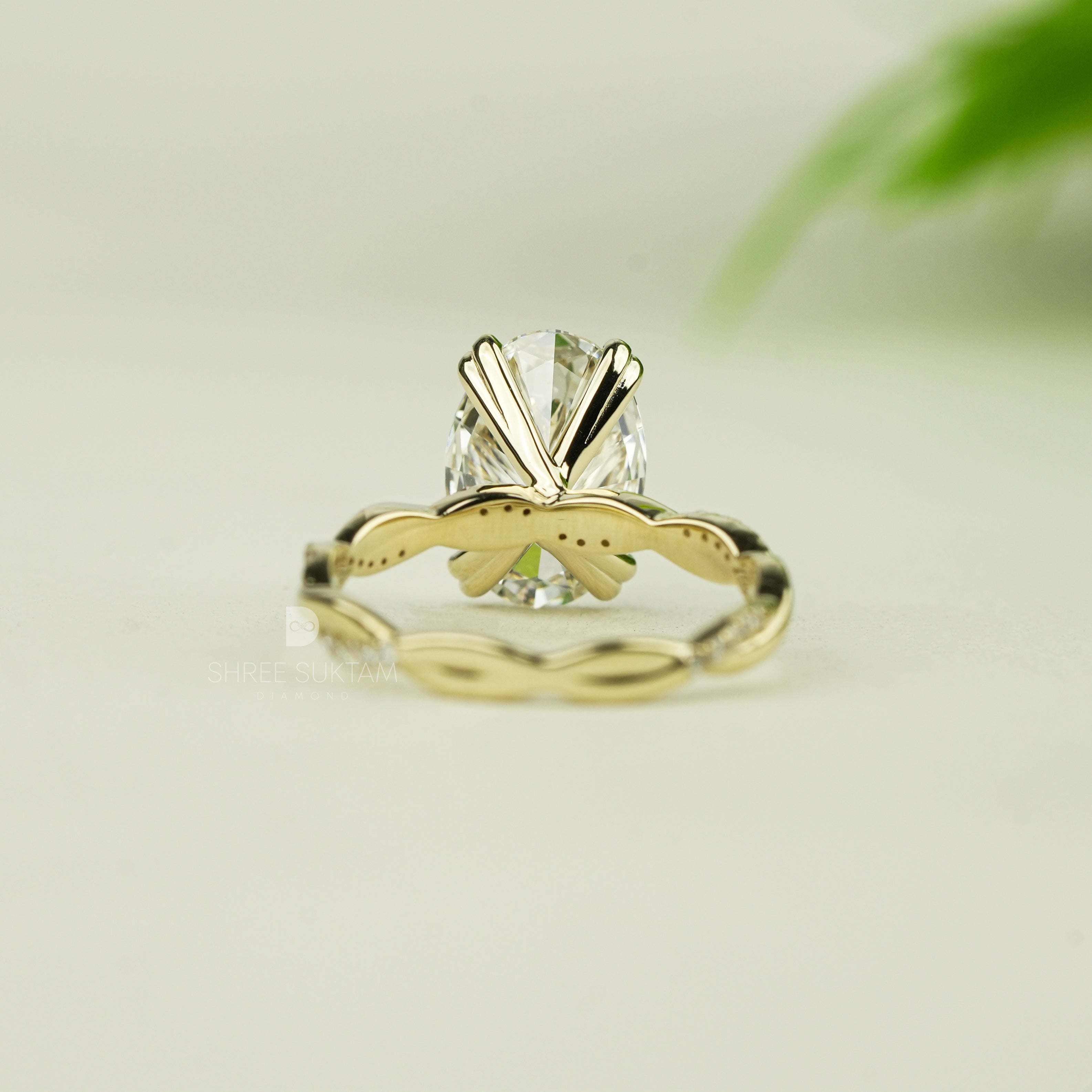 Stunning oval-cut diamond engagement ring set in yellow gold with intricate twisted band design. The solitaire diamond is securely held by four elegant prongs, reflecting brilliance and fire. A delicate and romantic piece of fine jewelry, perfect for engagements, proposals, anniversaries, or special occasions. A handcrafted timeless ring that radiates luxury, charm, and sophistication for the modern bride-to-be moissanite watch