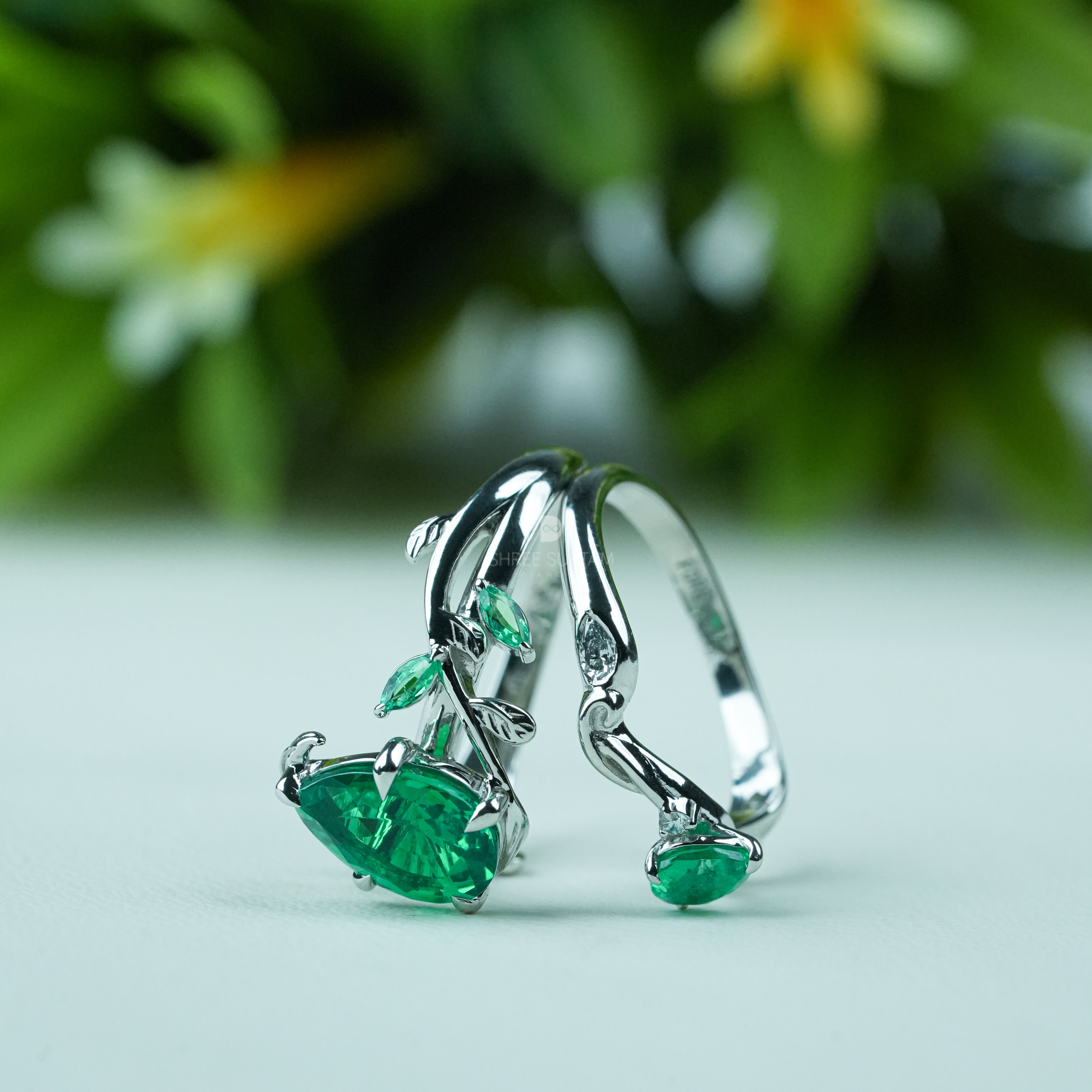 Emerald engagement ring, nature inspired ring, vine leaf ring, silver emerald jewelry, green gemstone ring, pear cut emerald ring, statement emerald ring, vintage style emerald ring, botanical jewelry, leaf design ring, gemstone promise ring, emerald wedding ring, nature lover jewelry, unique emerald ring, silver gemstone ring, anniversary gift ring, handmade emerald jewelry, bridal emerald ring, boho emerald ring, luxury gemstone jewelry.