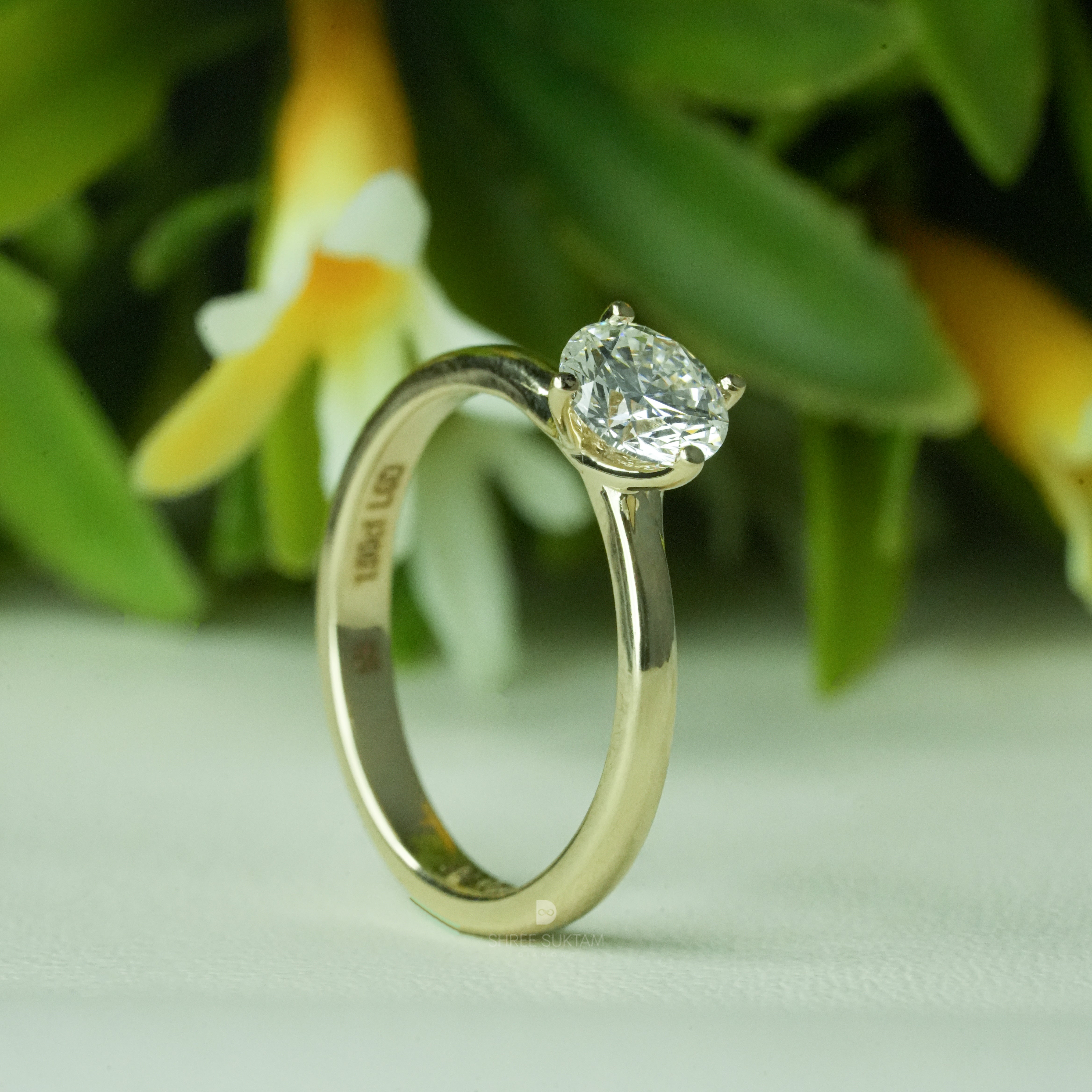 round diamond engagement ring, solitaire diamond ring, yellow gold diamond ring, minimalist engagement ring, classic proposal ring, round brilliant diamond ring, gold solitaire ring, women diamond ring, timeless engagement ring, fine jewelry ring, simple diamond ring, bridal engagement ring, promise ring diamond, elegant gold ring, handcrafted diamond ring, luxury engagement jewelry, anniversary diamond ring, dainty diamond ring, everyday diamond ring