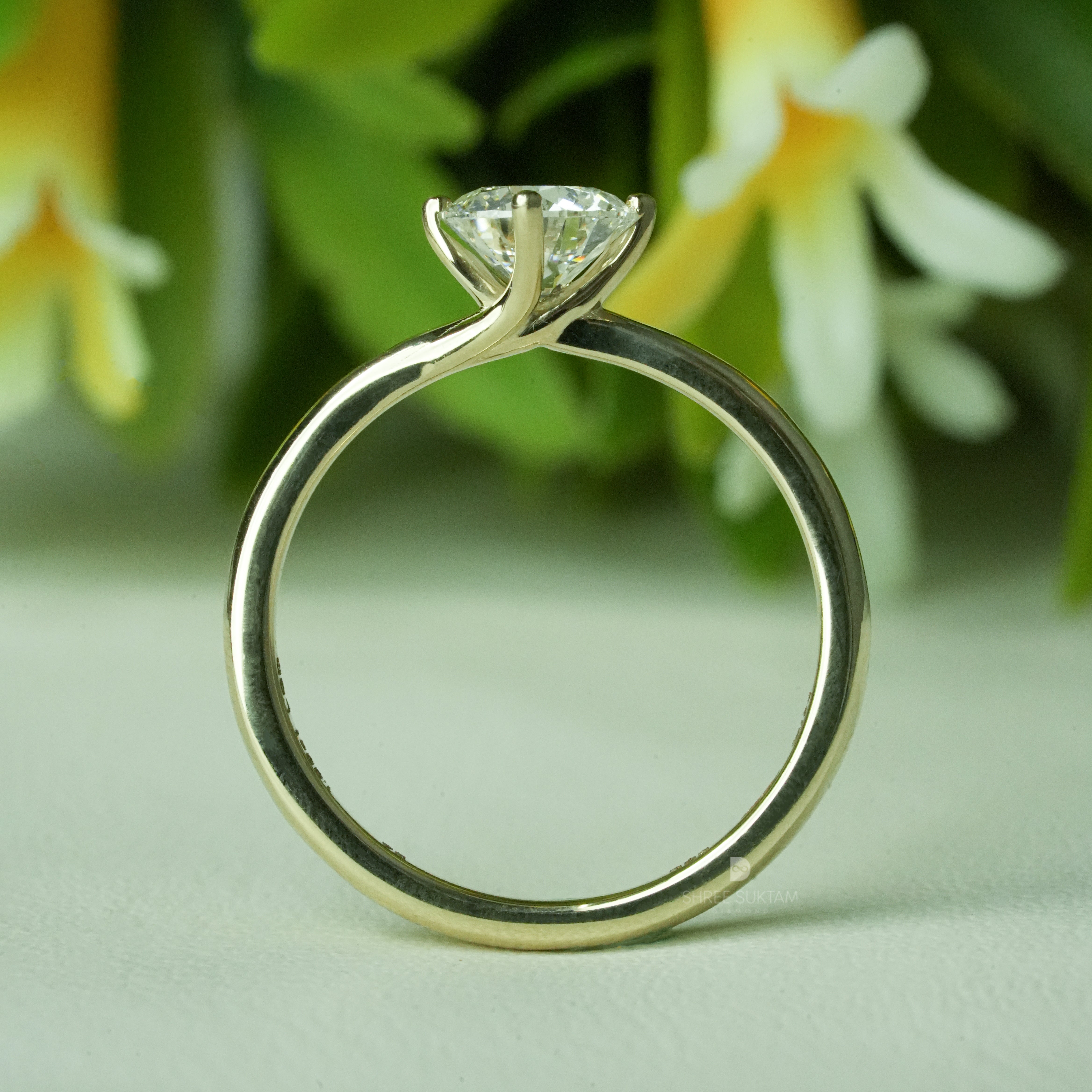 solitaire diamond
engagement ring
diamond ring
yellow gold ring
minimalist ring
proposal ring
bridal ring
classic jewelry
round diamond
fine jewelry
timeless ring
promise ring
luxury ring