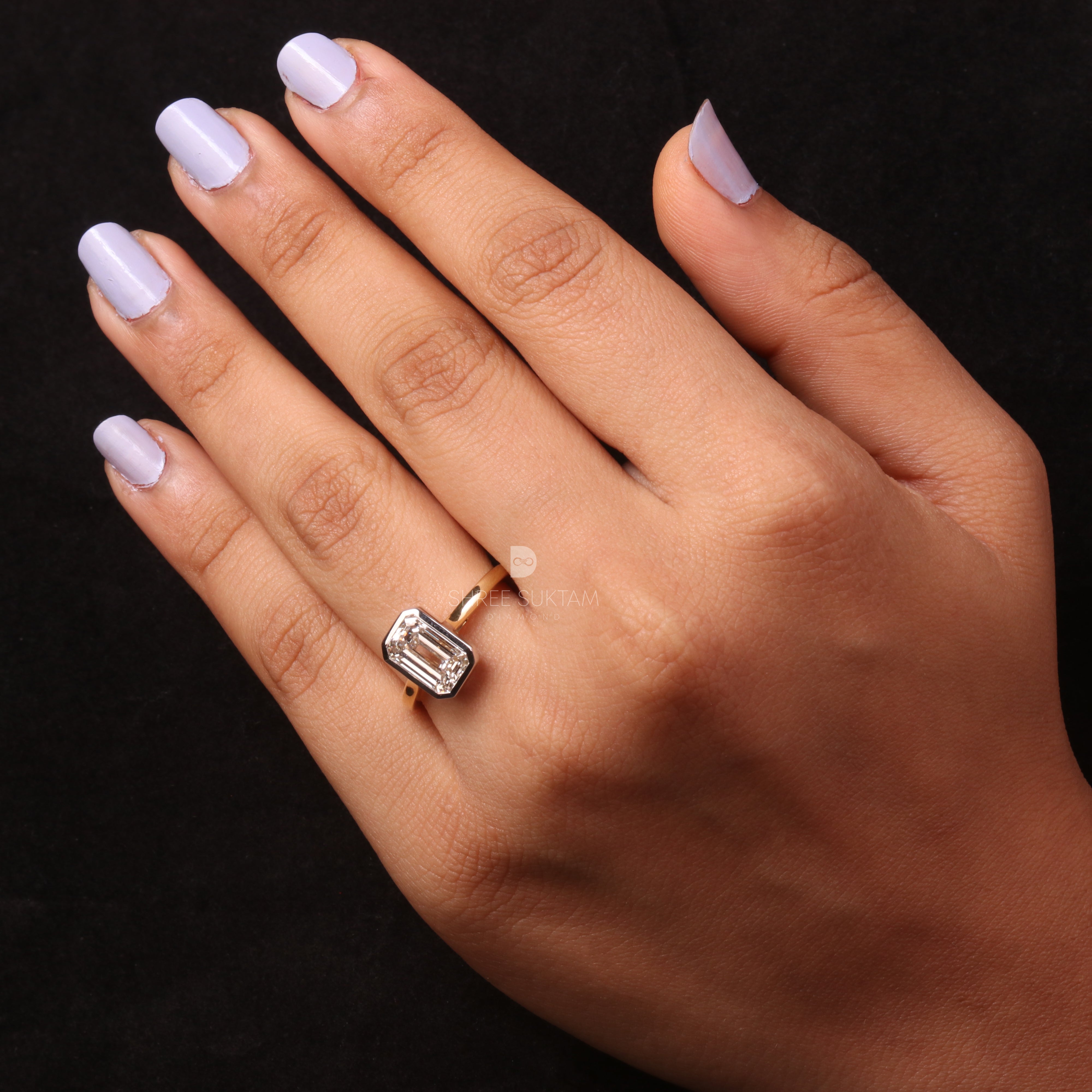 emerald cut diamond ring, bezel set engagement ring, yellow gold diamond ring, minimalist diamond ring, solitaire engagement ring, emerald cut solitaire ring, modern bridal jewelry, classic gold ring, dainty diamond ring, handmade engagement ring, fine gold jewelry, custom diamond ring, timeless engagement ring, wedding ring for women, luxury diamond ring, ethical gold ring, emerald ring for proposal, gift for her Western Ring 